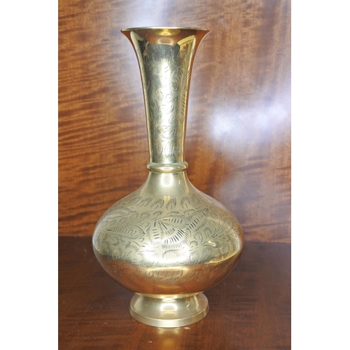 87 - A decorative Indian brass vase.