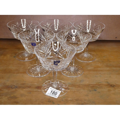 180 - A set of six Cavan Crystal champagne saucers.