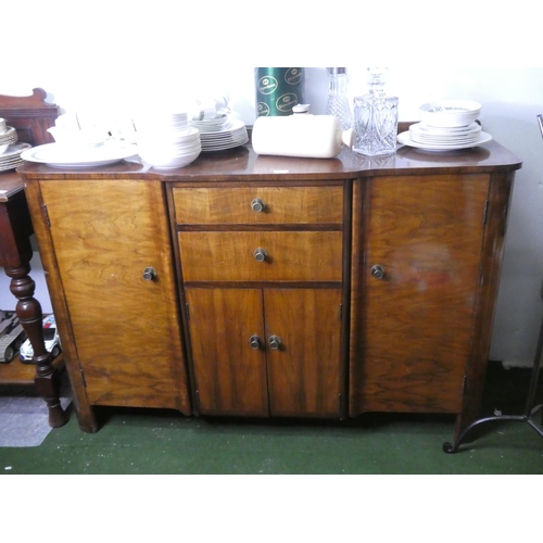 232 - A vintage sideboard with stepped front.