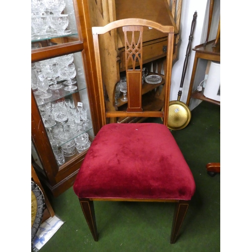 148 - An antique inlaid mahogany bedroom chair.