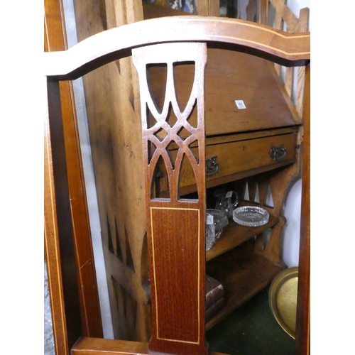 148 - An antique inlaid mahogany bedroom chair.