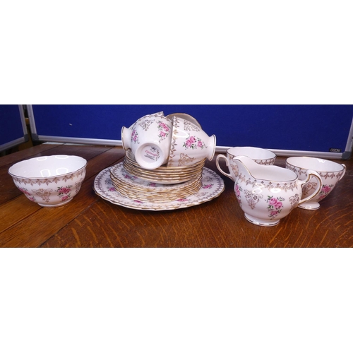 105 - A decorative Colclough 6 piece tea set with milk jug, sugar bowl & sandwich plate.