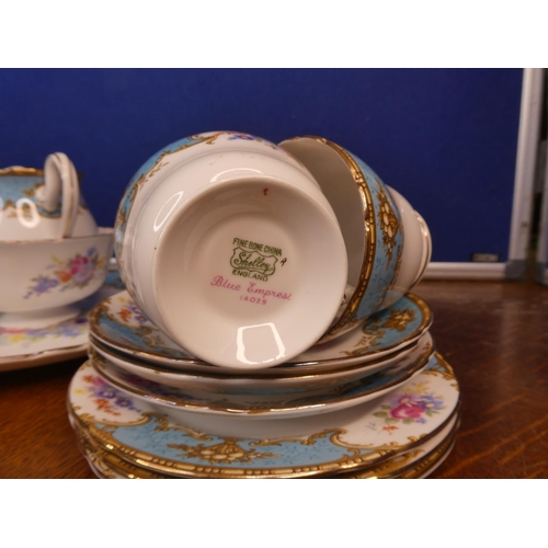 112 - A stunning antique/ vintage Shelley 'Blue Empress' tea set, to include milk jug, sugar bowl & sandwi... 