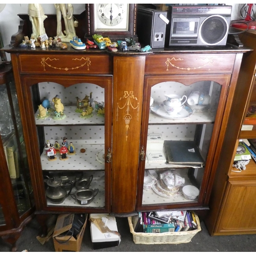 113 - A decorative antique display cabinet with inlaid design.