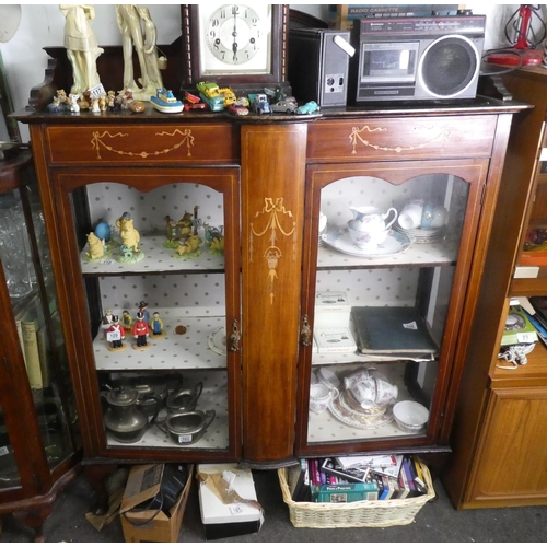 113 - A decorative antique display cabinet with inlaid design.