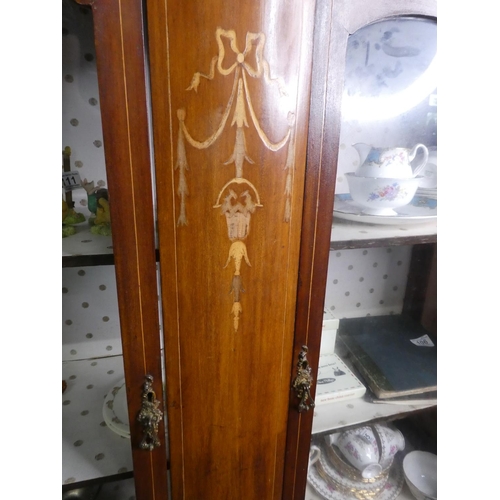 113 - A decorative antique display cabinet with inlaid design.