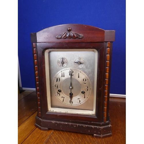 115 - An antique clock in need of restoration.