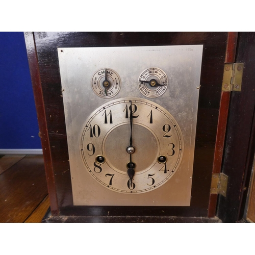 115 - An antique clock in need of restoration.