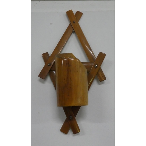 120 - A vintage bamboo wall mounted flower pot.