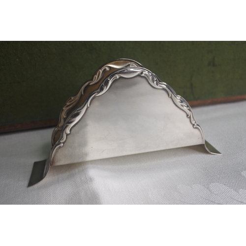 601 - A WMF silver plate letter holder and cake slice.