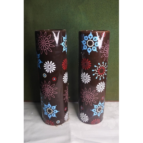 604 - A pair of decorative ceramic vases.