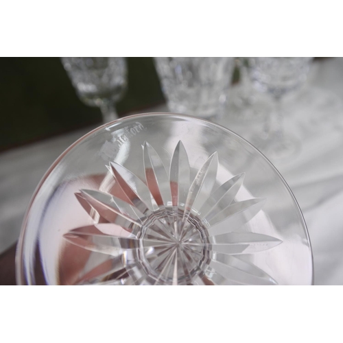 608 - A set of 6 Waterford Crystal Lismore wine glasses.