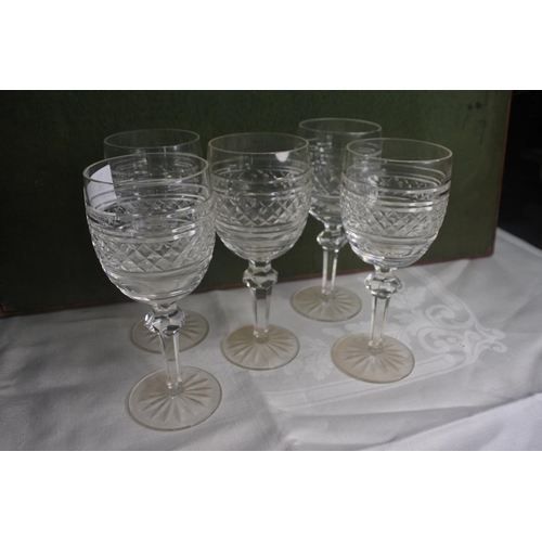 609 - A set of 5 Waterford Crystal wine glasses.