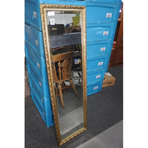 614 - A vintage/ retro gilt framed mirror with bevelled glass.