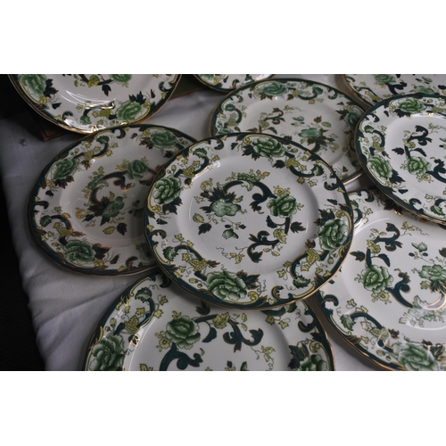 635 - A set of 11 Masons Ironstone Green 'Chartreuse' side plates.