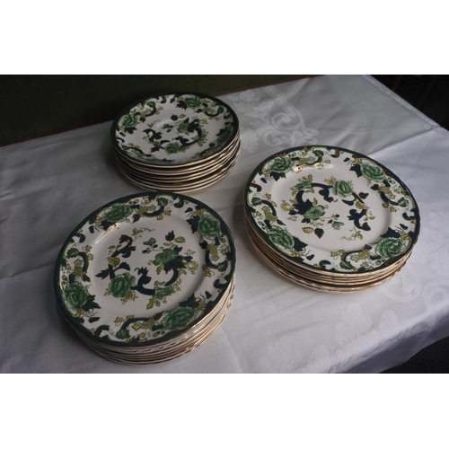 636 - A large assortment of Masons Ironstone Green 'Chartreuse' saucers/ plates.