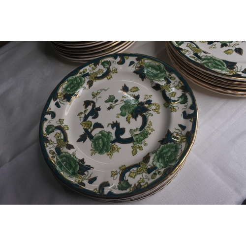 636 - A large assortment of Masons Ironstone Green 'Chartreuse' saucers/ plates.