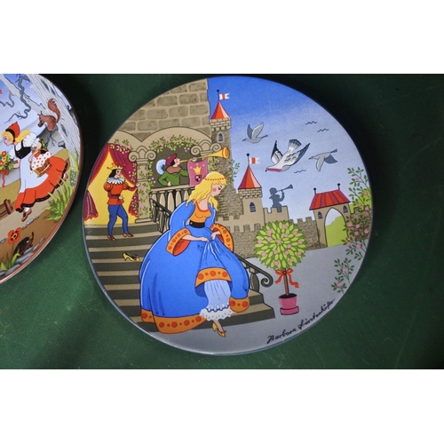 652 - A pair of Poole Pottery plates, 'Cinderella' & 'Little Red Riding Hood'.