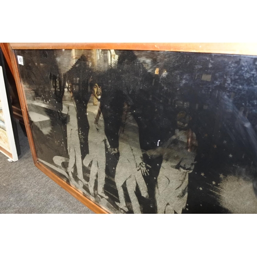 674 - A large vintage Beatles mirror.