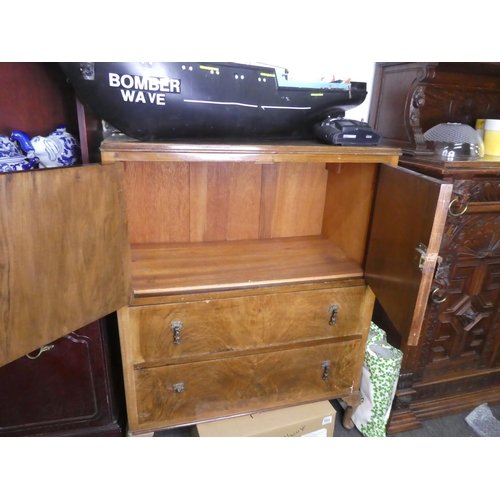 683 - An antique style cocktail cabinet.