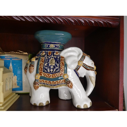 687 - A ceramic elephant plant pot stand.