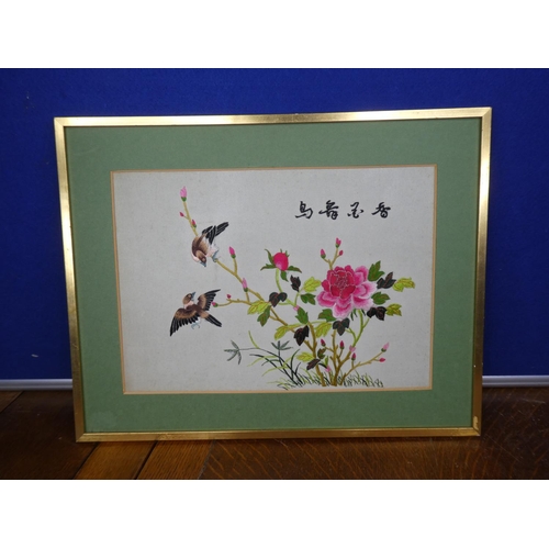 81 - A decorative framed Chinese/ Oriental needlepoint picture.