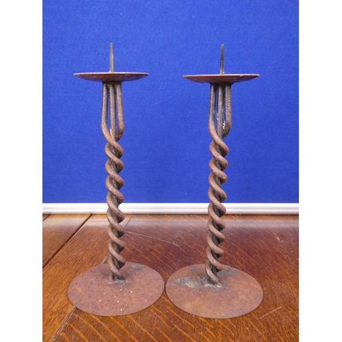 84 - A pair of decorative candlesticks.