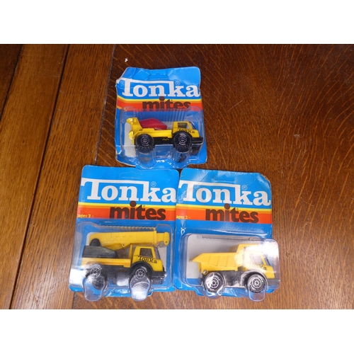 88 - A collection of 3 vintage Tonka Mites toys, to include Crane (opened), cement mixer & dump trunk (bo... 