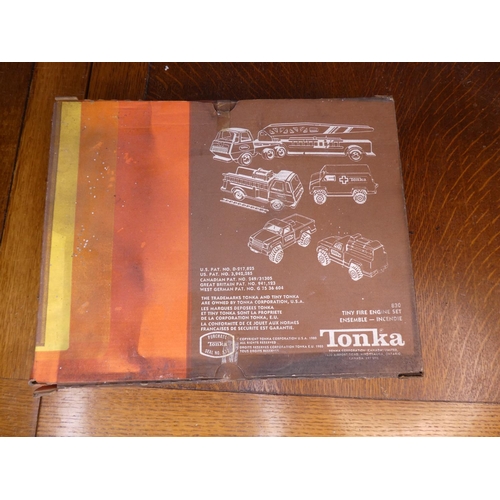 92 - A vintage Tonka Tiny Fire Engine set, number 830, still factory sealed.