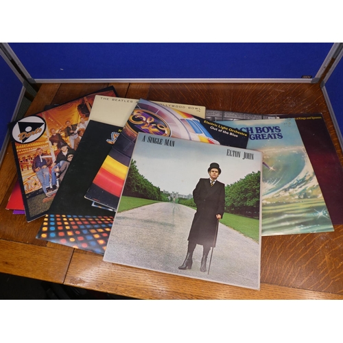 94 - A collection of records/ albums to include Elton John, ELO, Beach Boys, The Beatles & more.