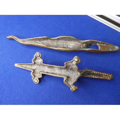 102 - A vintage brass nut cracker in the form of a crocodile.