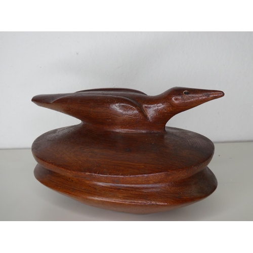 117 - An unusual carved wooden trinket box with bird topper.