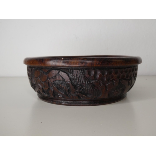 118 - A hand carved wooden bowl.