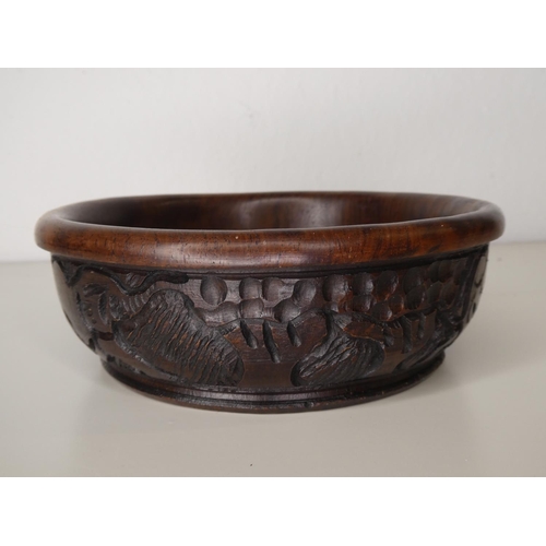 118 - A hand carved wooden bowl.