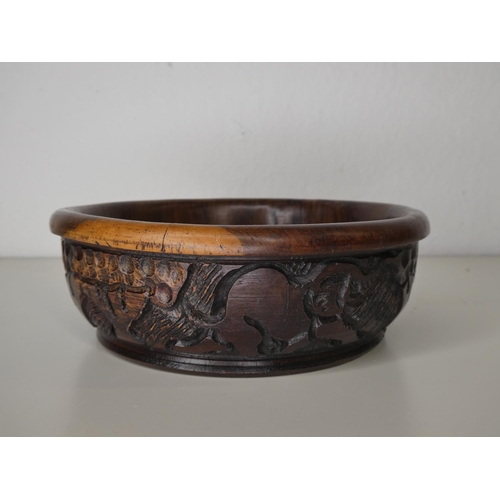 118 - A hand carved wooden bowl.