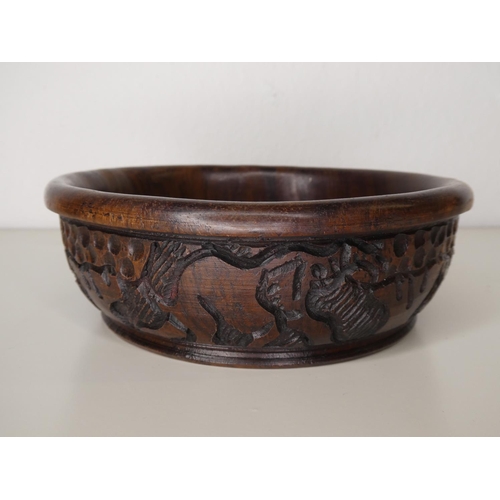 118 - A hand carved wooden bowl.