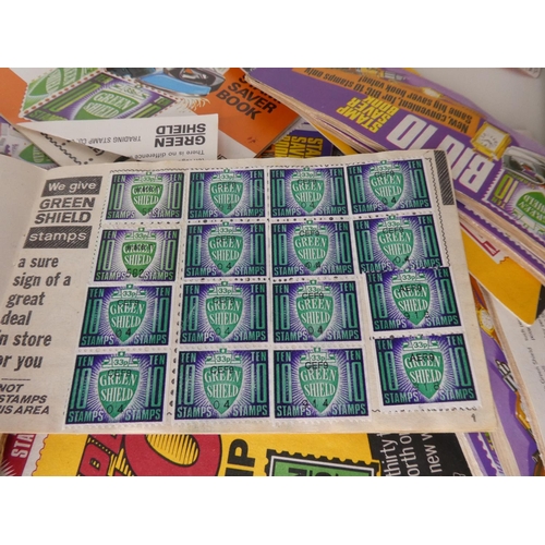 127 - An assortment of vintage green shield/ super saver stamps etc.