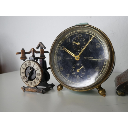 129 - A collection of 4 vintage clocks.