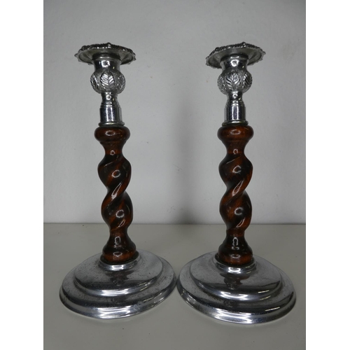 150 - A pair of decorative wood & metal candlesticks.