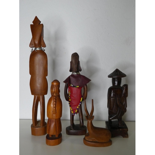 193 - An assortment of carved wooden figures.