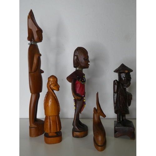 193 - An assortment of carved wooden figures.