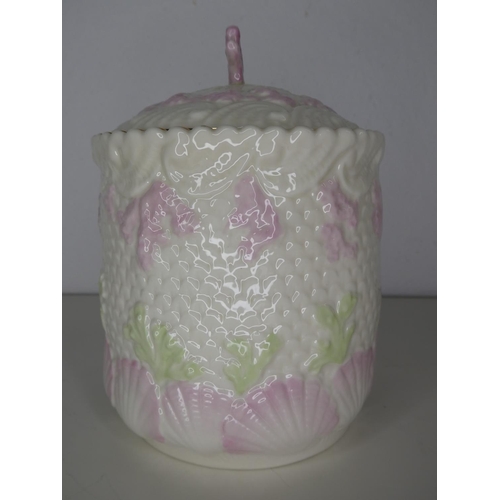 200 - A stunning Belleek Pottery biscuit barrel.