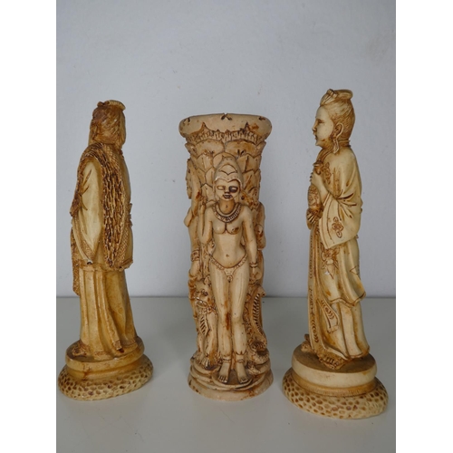 203 - A collection of 3 decorative carved figures.