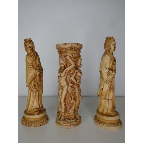 203 - A collection of 3 decorative carved figures.