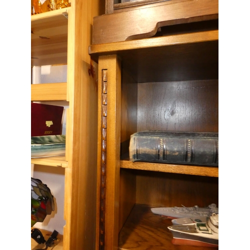 206 - A wooden bookcase with drawers to base.