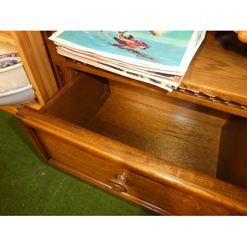 206 - A wooden bookcase with drawers to base.