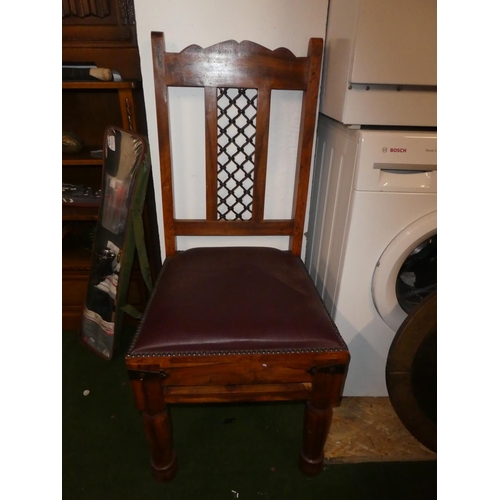 217 - A decorative wooden chair.