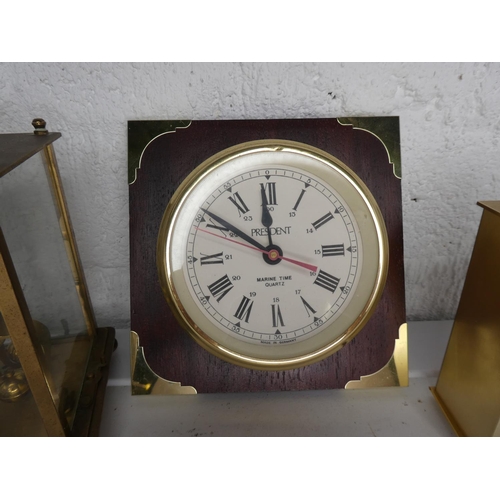 250 - A collection of 3 clocks.