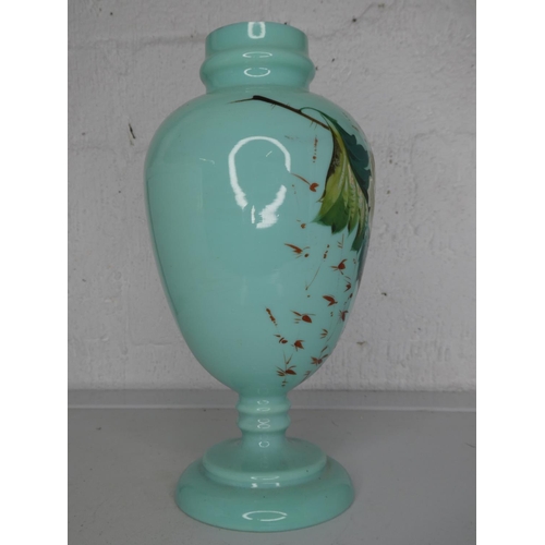 275 - A decorative antique hand painted glass vase.