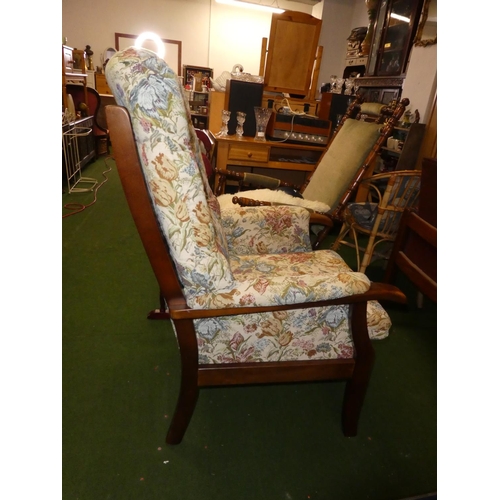 303 - A vintage/ retro fireside armchair.